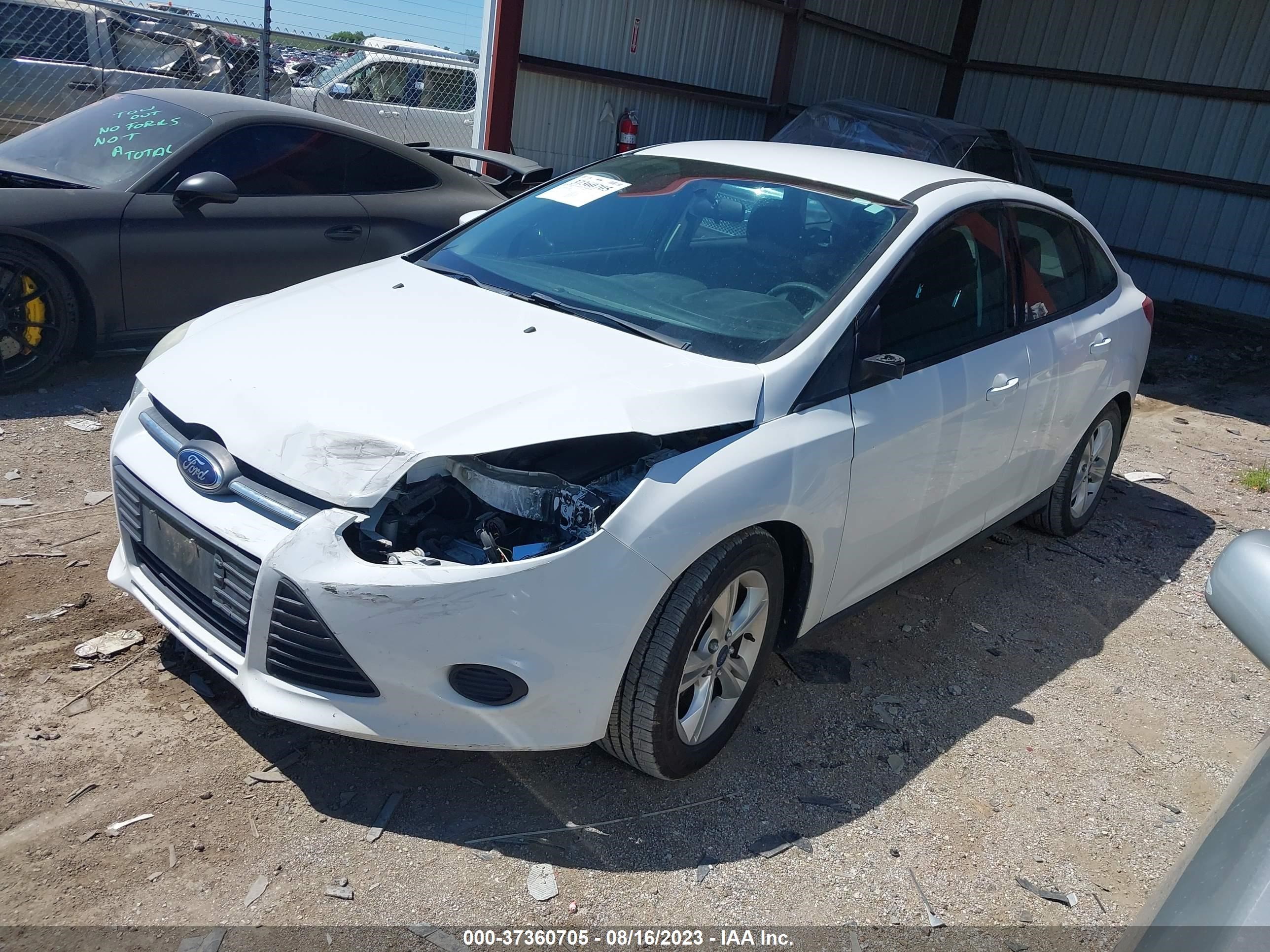 Photo 1 VIN: 1FADP3F29EL177679 - FORD FOCUS 