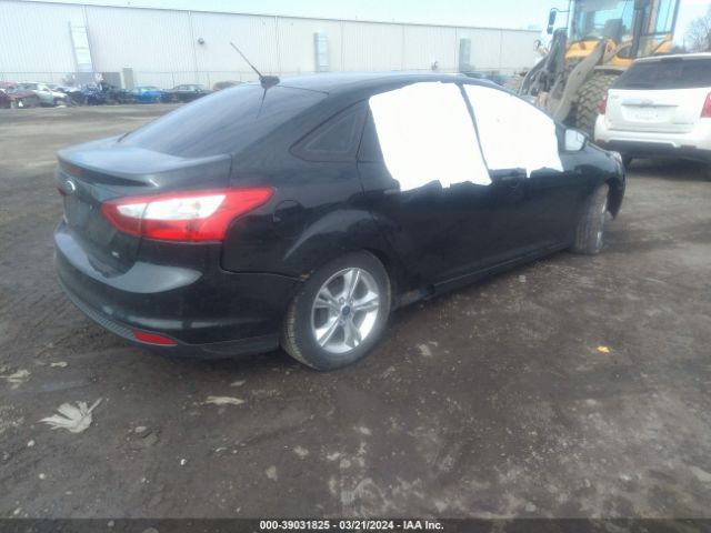 Photo 3 VIN: 1FADP3F29EL232504 - FORD FOCUS 