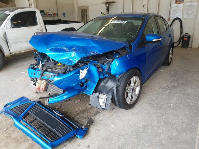 Photo 1 VIN: 1FADP3F29EL234396 - FORD FOCUS SE 