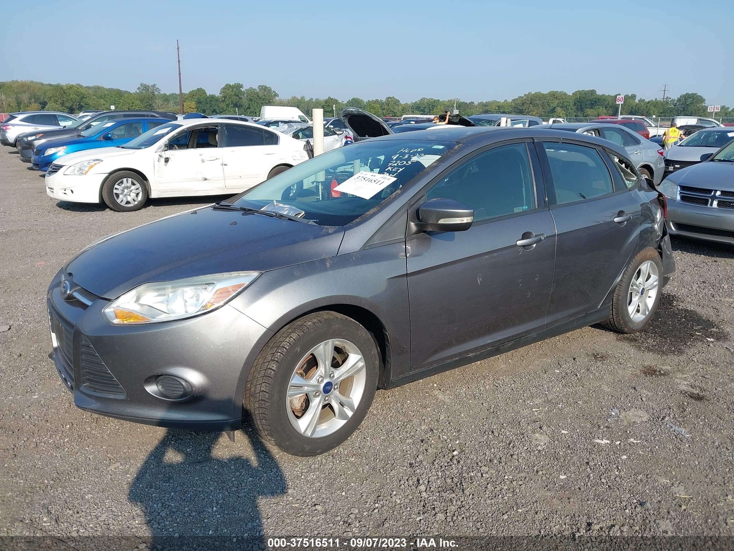 Photo 1 VIN: 1FADP3F29EL267205 - FORD FOCUS 