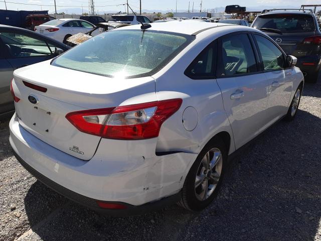 Photo 3 VIN: 1FADP3F29EL283324 - FORD FOCUS SE 