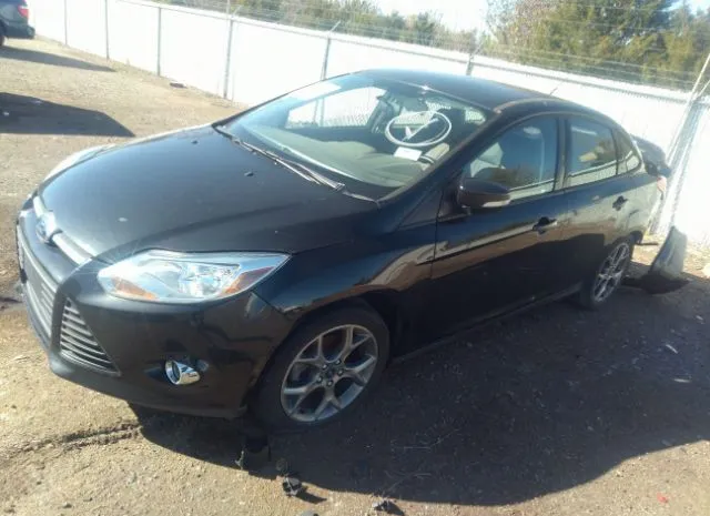 Photo 1 VIN: 1FADP3F29EL370799 - FORD FOCUS 