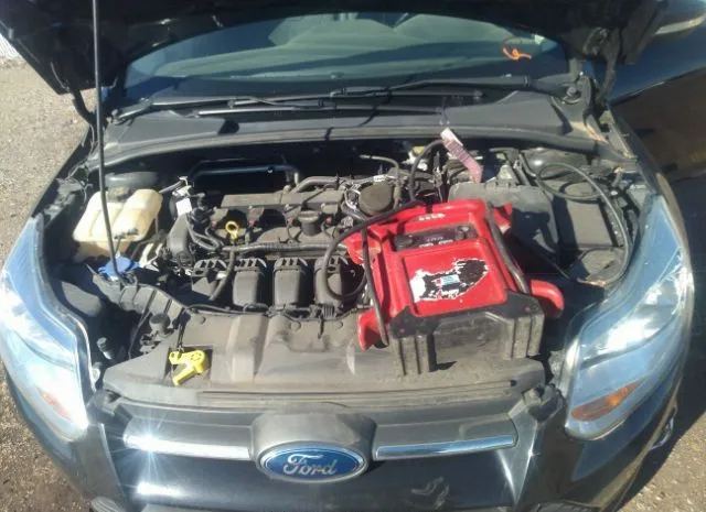 Photo 9 VIN: 1FADP3F29EL370799 - FORD FOCUS 