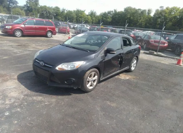 Photo 1 VIN: 1FADP3F29EL388977 - FORD FOCUS 