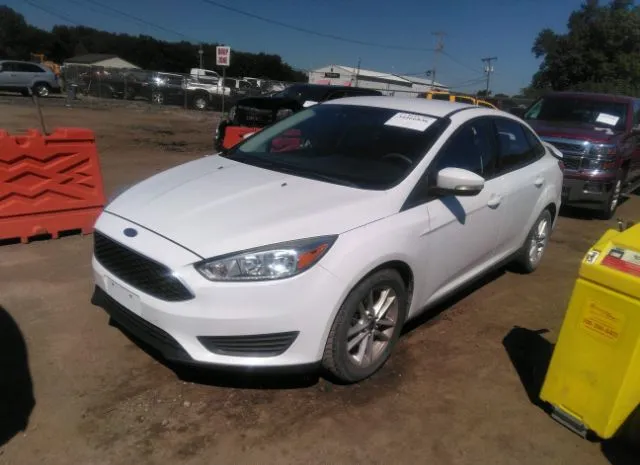 Photo 1 VIN: 1FADP3F29FL269909 - FORD FOCUS 