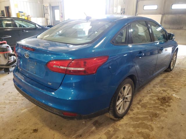 Photo 3 VIN: 1FADP3F29FL318882 - FORD FOCUS 