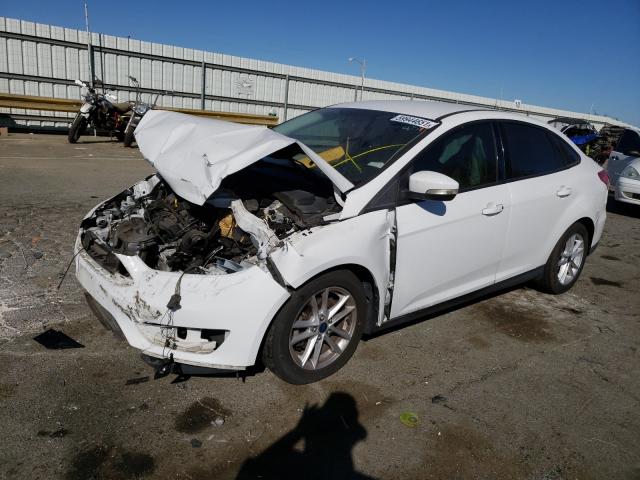 Photo 1 VIN: 1FADP3F29FL330384 - FORD FOCUS SE 