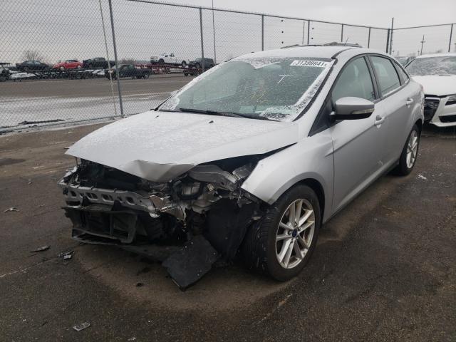 Photo 1 VIN: 1FADP3F29GL204382 - FORD FOCUS SE 