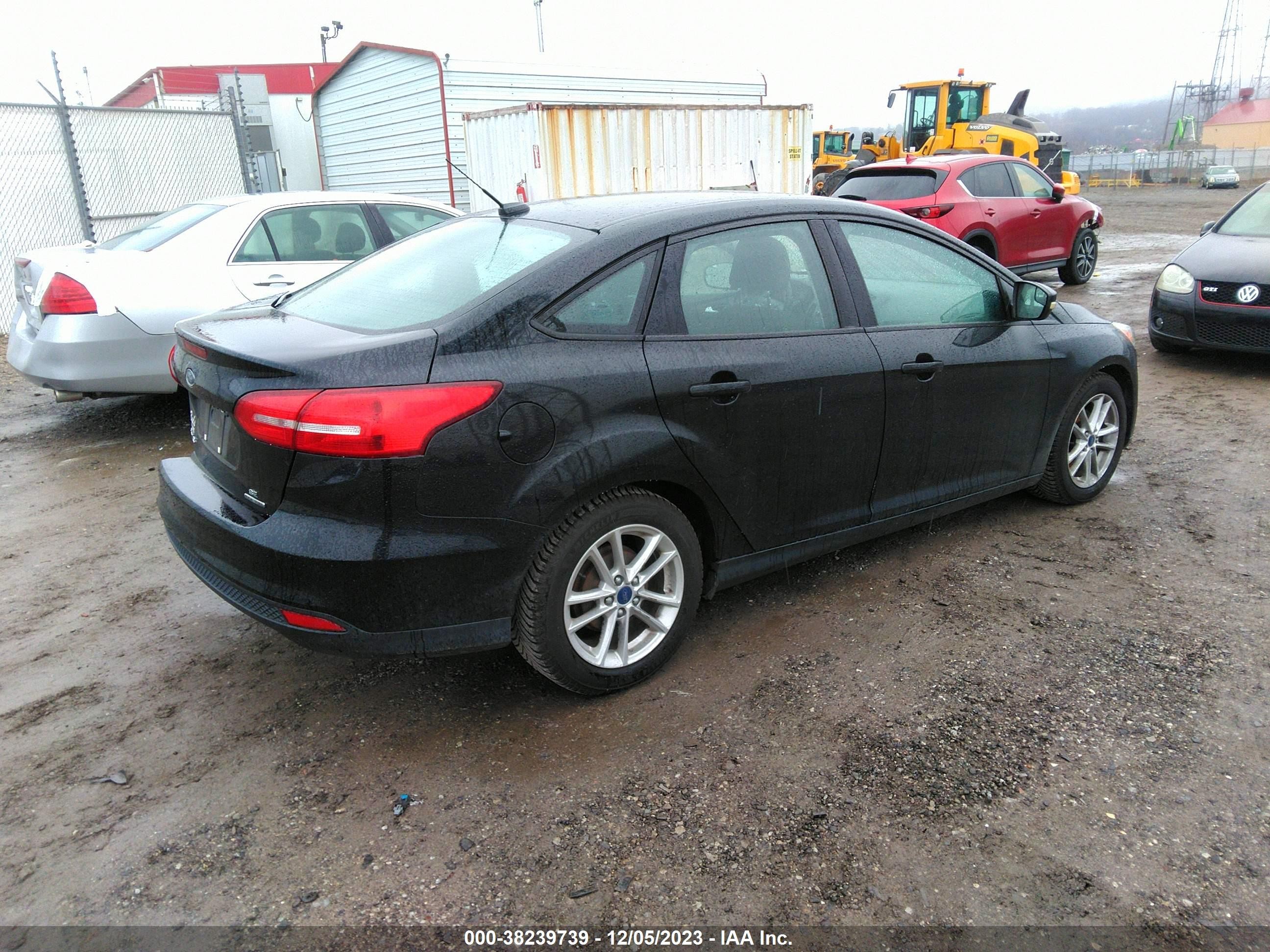 Photo 3 VIN: 1FADP3F29GL213390 - FORD FOCUS 