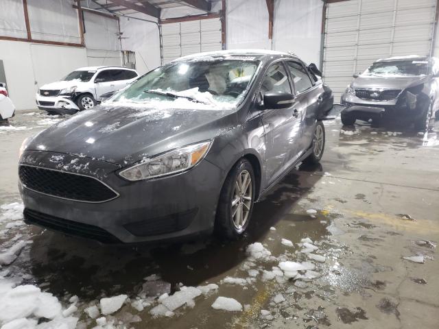 Photo 1 VIN: 1FADP3F29GL214202 - FORD FOCUS SE 