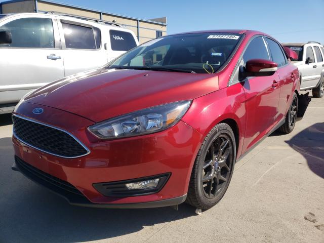 Photo 1 VIN: 1FADP3F29GL214281 - FORD FOCUS SE 