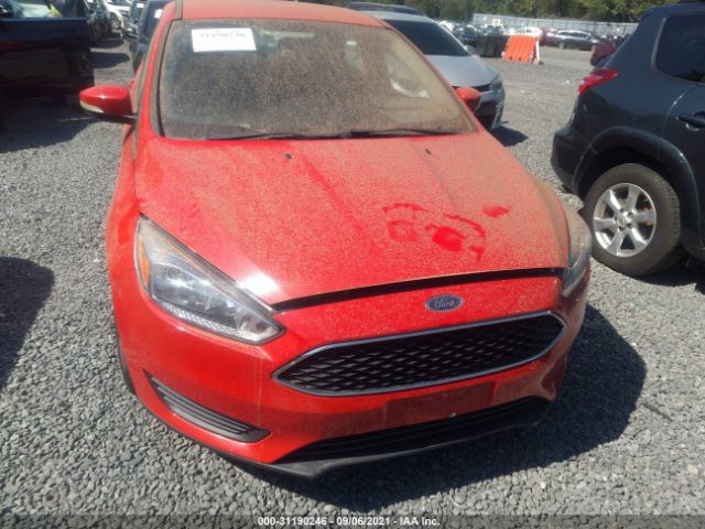 Photo 5 VIN: 1FADP3F29GL222512 - FORD FOCUS 