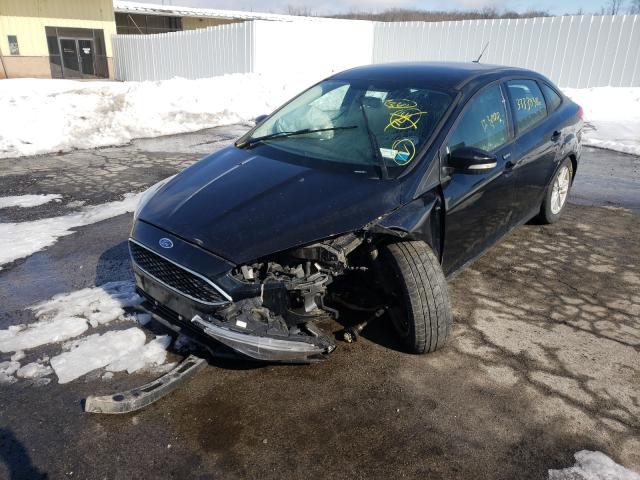 Photo 1 VIN: 1FADP3F29GL223689 - FORD FOCUS SE 