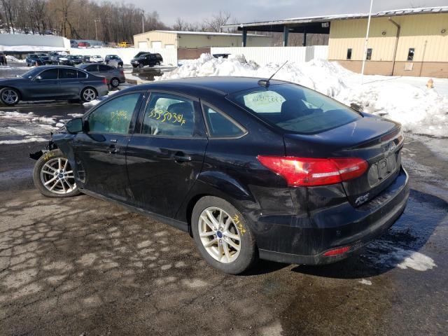 Photo 2 VIN: 1FADP3F29GL223689 - FORD FOCUS SE 