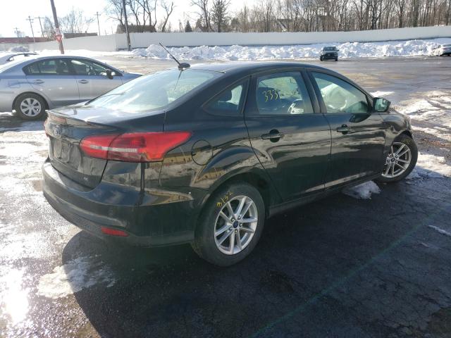 Photo 3 VIN: 1FADP3F29GL223689 - FORD FOCUS SE 