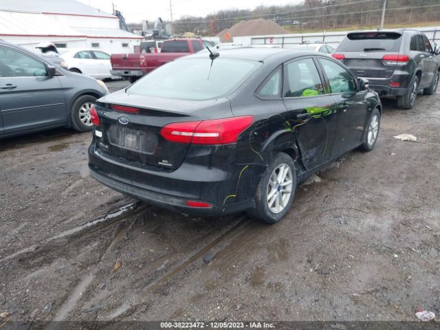 Photo 3 VIN: 1FADP3F29GL229203 - FORD FOCUS 