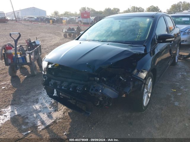 Photo 5 VIN: 1FADP3F29GL229427 - FORD FOCUS 