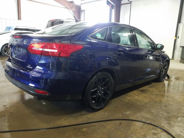 Photo 3 VIN: 1FADP3F29GL233428 - FORD FOCUS 