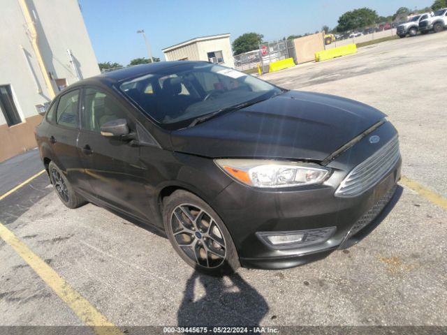 Photo 4 VIN: 1FADP3F29GL237589 - FORD FOCUS 