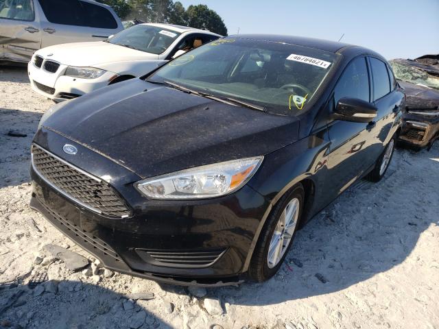 Photo 1 VIN: 1FADP3F29GL241013 - FORD FOCUS SE 