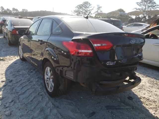 Photo 2 VIN: 1FADP3F29GL241013 - FORD FOCUS SE 