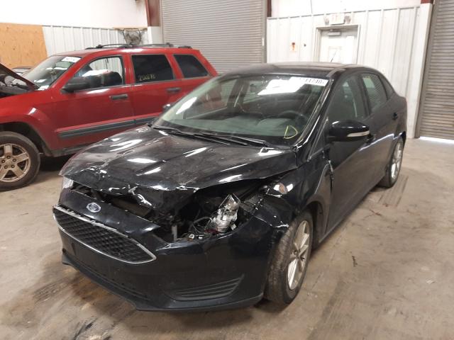 Photo 1 VIN: 1FADP3F29GL241884 - FORD FOCUS SE 