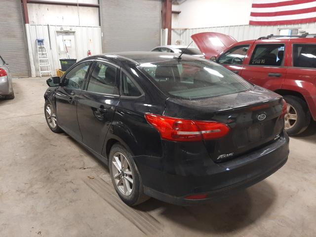 Photo 2 VIN: 1FADP3F29GL241884 - FORD FOCUS SE 