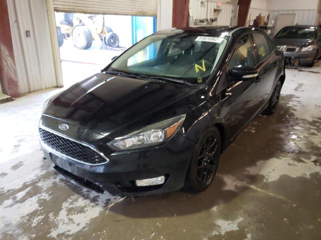 Photo 1 VIN: 1FADP3F29GL243506 - FORD FOCUS SE 