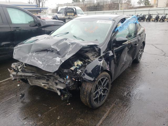 Photo 1 VIN: 1FADP3F29GL245210 - FORD FOCUS SE 