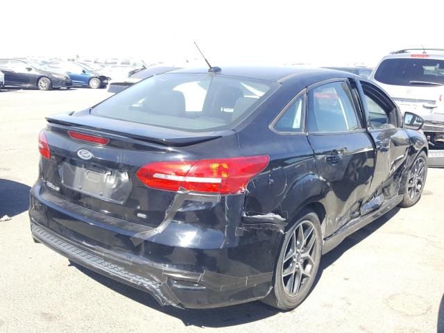 Photo 3 VIN: 1FADP3F29GL246857 - FORD FOCUS SE 