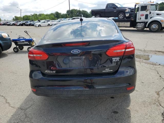 Photo 5 VIN: 1FADP3F29GL249015 - FORD FOCUS SE 