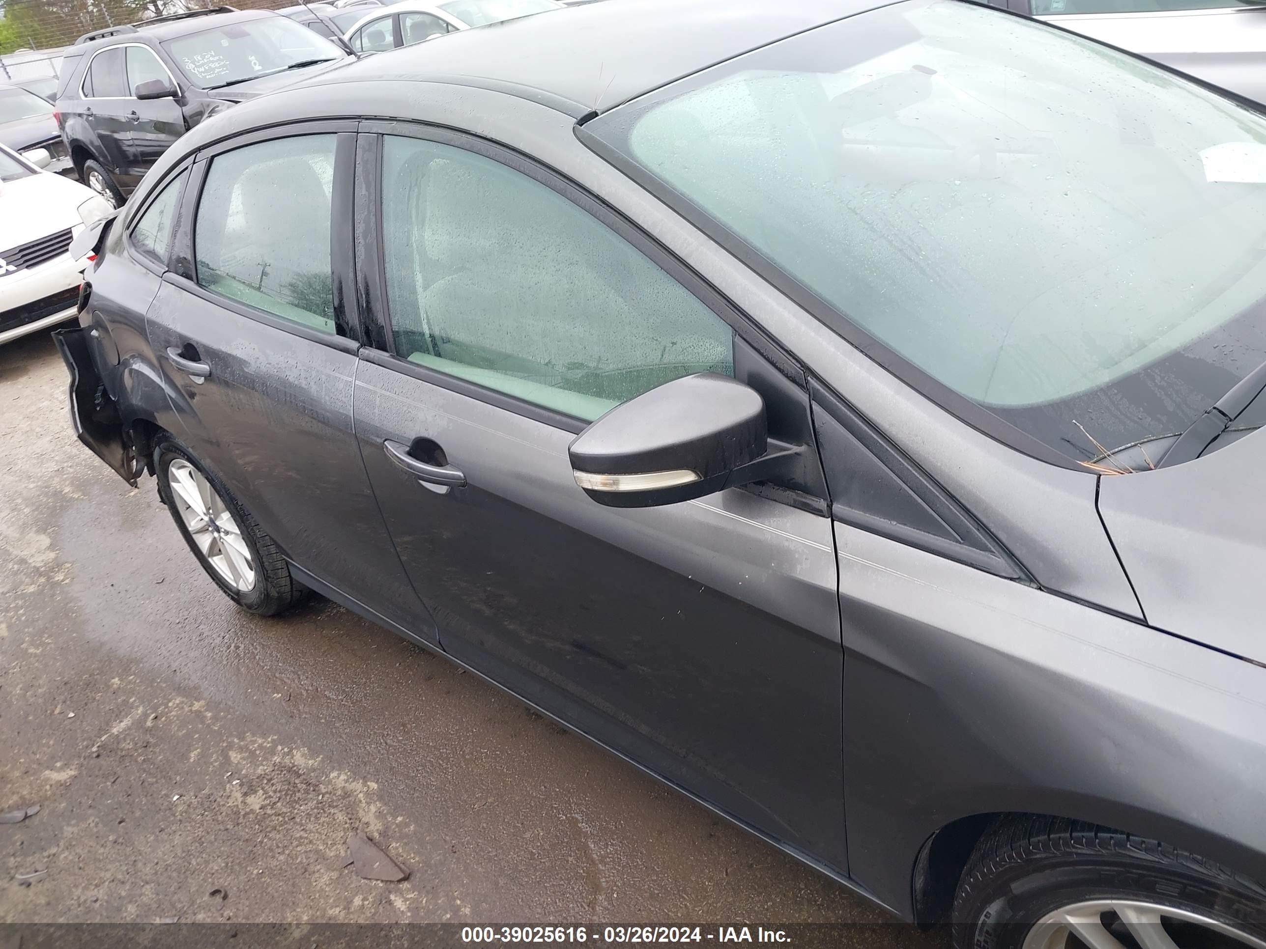 Photo 12 VIN: 1FADP3F29GL249323 - FORD FOCUS 