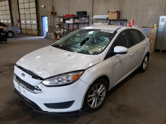 Photo 1 VIN: 1FADP3F29GL251119 - FORD FOCUS 