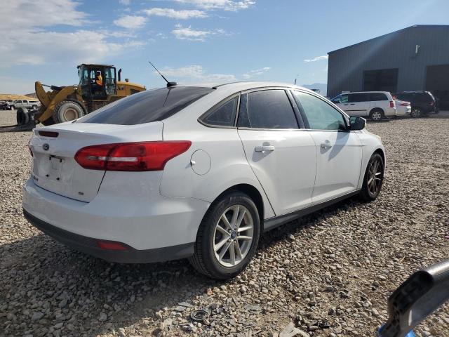 Photo 2 VIN: 1FADP3F29GL255607 - FORD FOCUS SE 