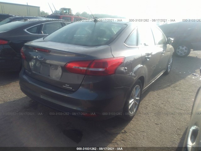 Photo 3 VIN: 1FADP3F29GL262279 - FORD FOCUS 