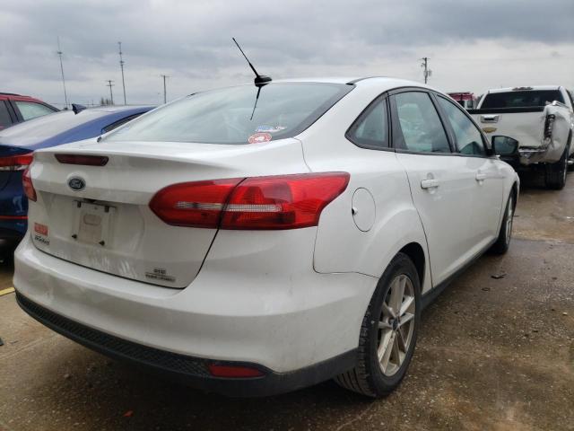 Photo 3 VIN: 1FADP3F29GL263884 - FORD FOCUS SE 