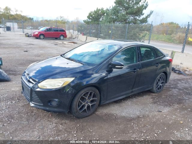 Photo 1 VIN: 1FADP3F29GL273492 - FORD FOCUS 