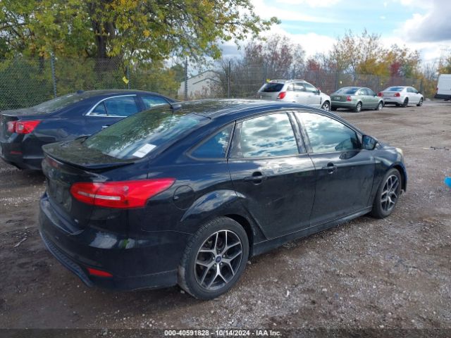 Photo 3 VIN: 1FADP3F29GL273492 - FORD FOCUS 