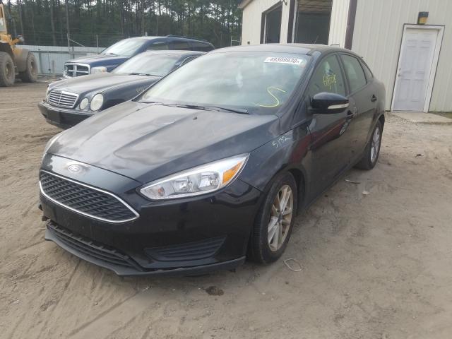 Photo 1 VIN: 1FADP3F29GL279096 - FORD FOCUS SE 