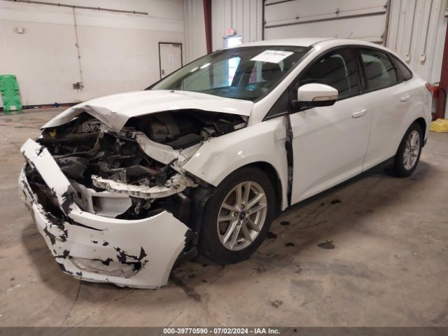 Photo 1 VIN: 1FADP3F29GL297128 - FORD FOCUS 