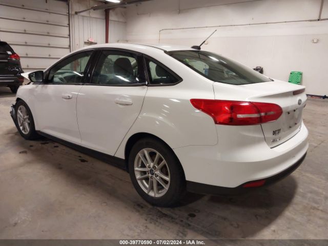 Photo 2 VIN: 1FADP3F29GL297128 - FORD FOCUS 