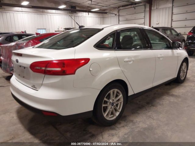 Photo 3 VIN: 1FADP3F29GL297128 - FORD FOCUS 