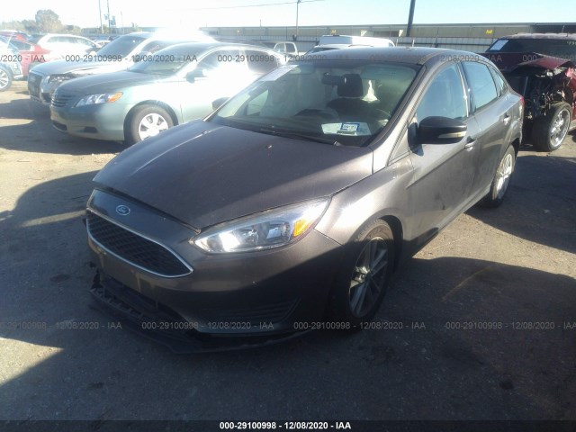 Photo 1 VIN: 1FADP3F29GL300528 - FORD FOCUS 