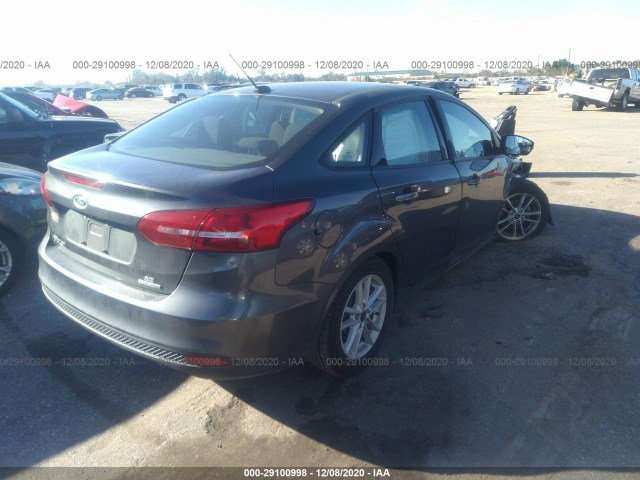 Photo 3 VIN: 1FADP3F29GL300528 - FORD FOCUS 