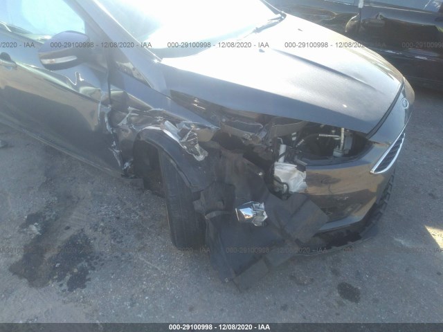 Photo 5 VIN: 1FADP3F29GL300528 - FORD FOCUS 