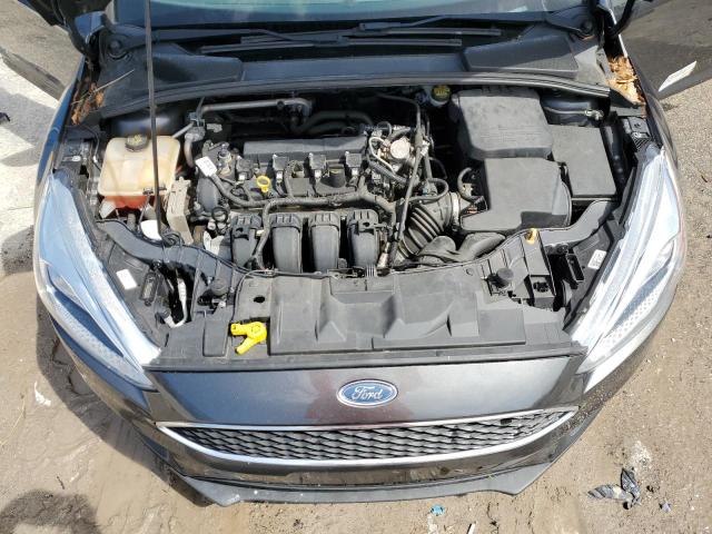 Photo 10 VIN: 1FADP3F29GL304739 - FORD FOCUS SE 