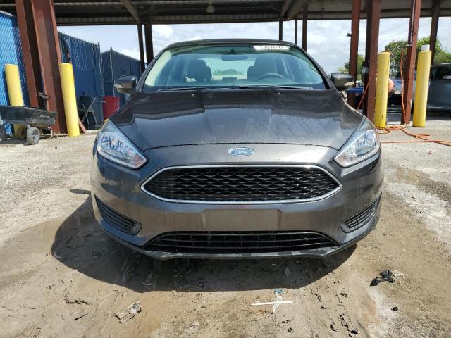 Photo 4 VIN: 1FADP3F29GL304739 - FORD FOCUS SE 