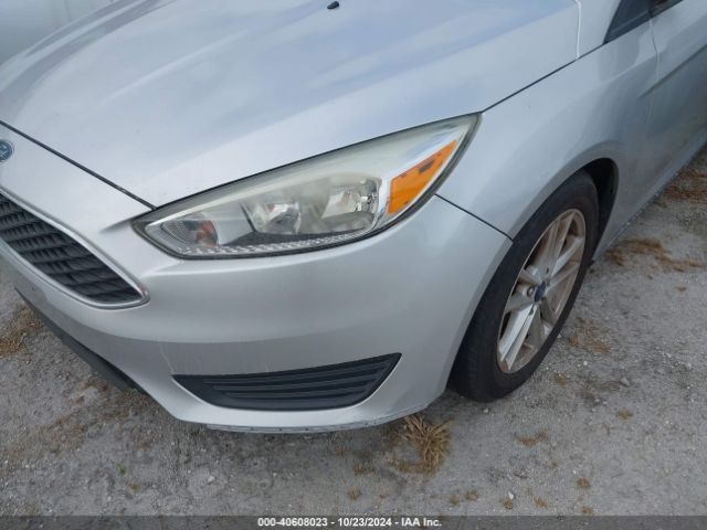 Photo 5 VIN: 1FADP3F29GL309228 - FORD FOCUS 