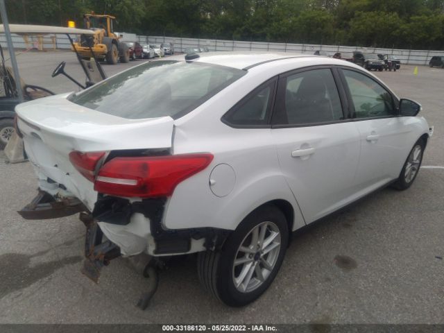 Photo 3 VIN: 1FADP3F29GL333190 - FORD FOCUS 