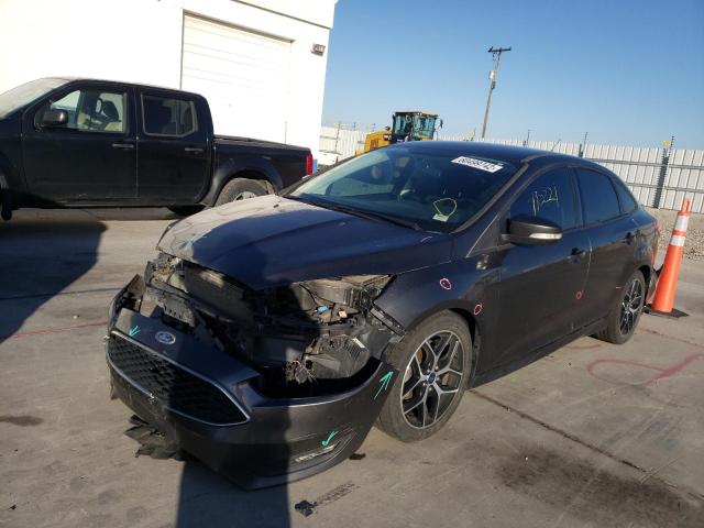 Photo 1 VIN: 1FADP3F29GL337286 - FORD FOCUS SE 